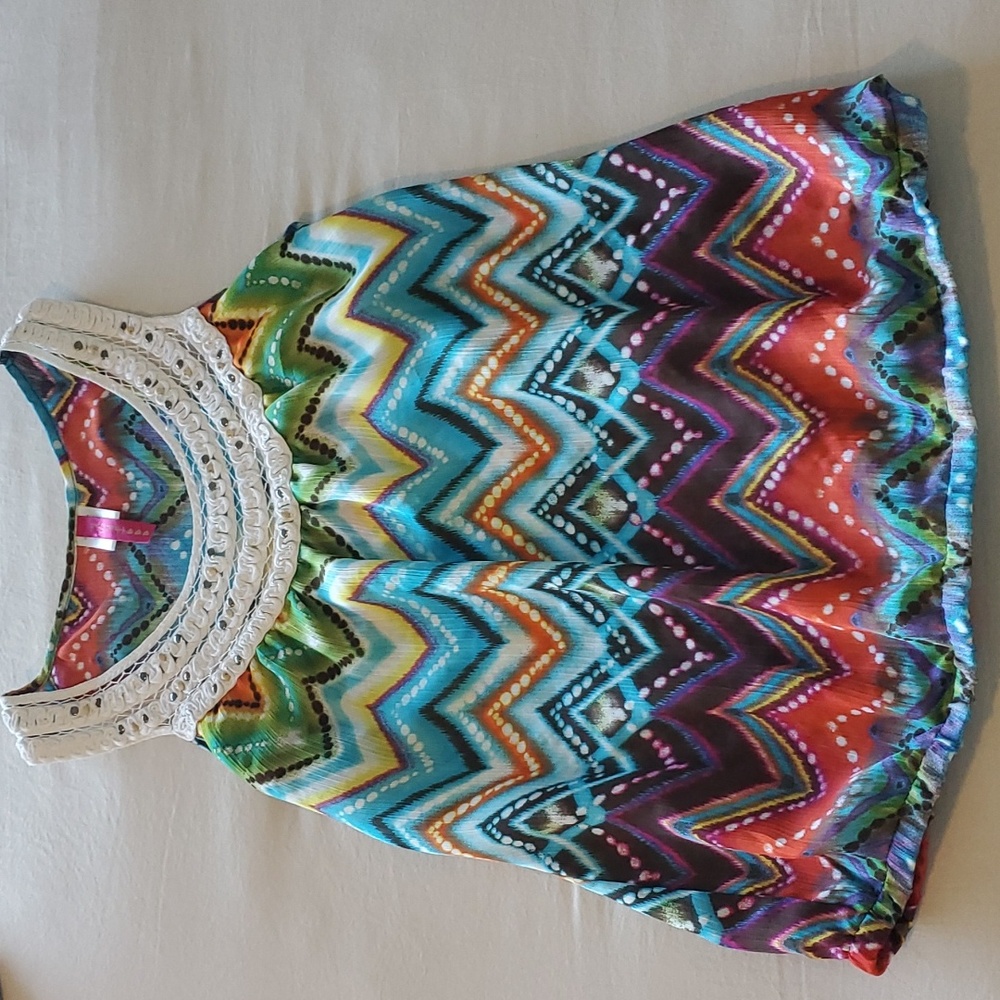 VIBRANT SLEEVELESS BLOUSE